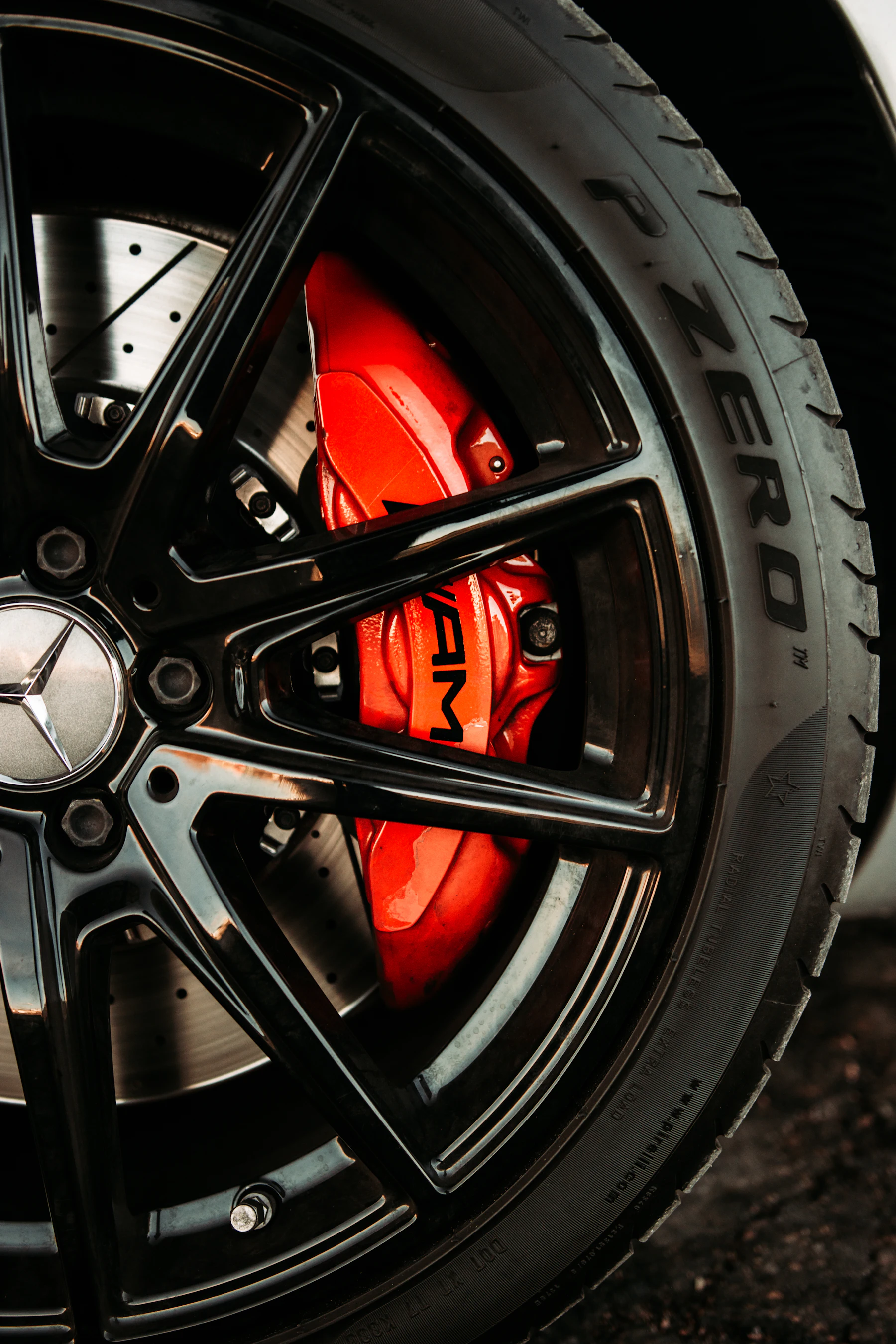 Sports car wheel and brake caliper