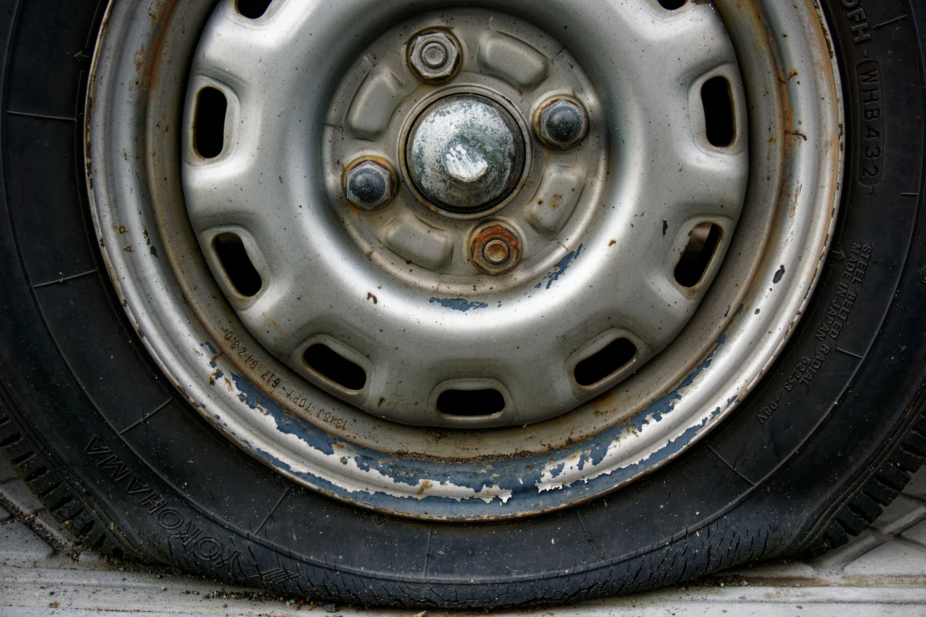 Flat tyre on a car wheel