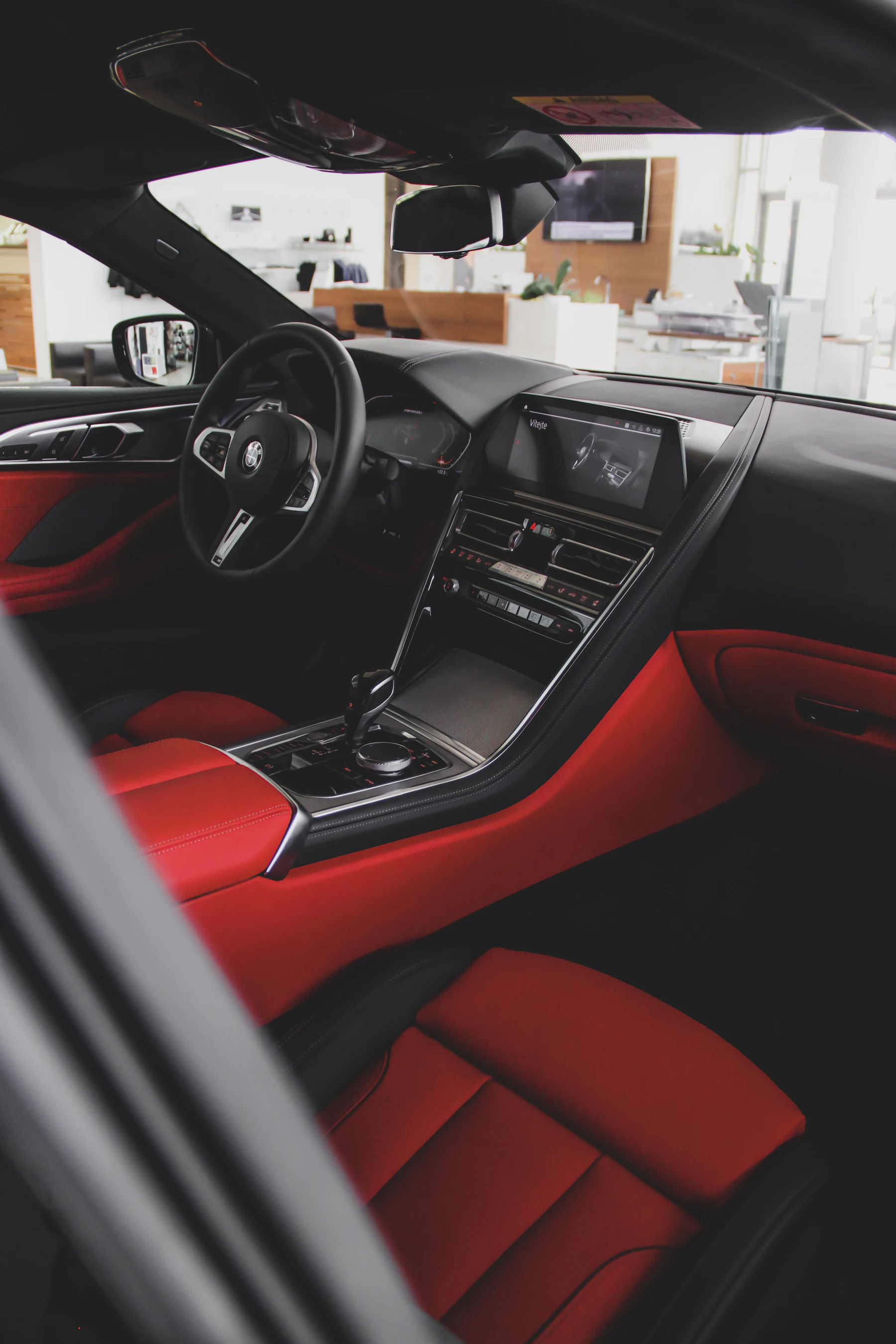 Clean dashboard and leather seats inside a modern car